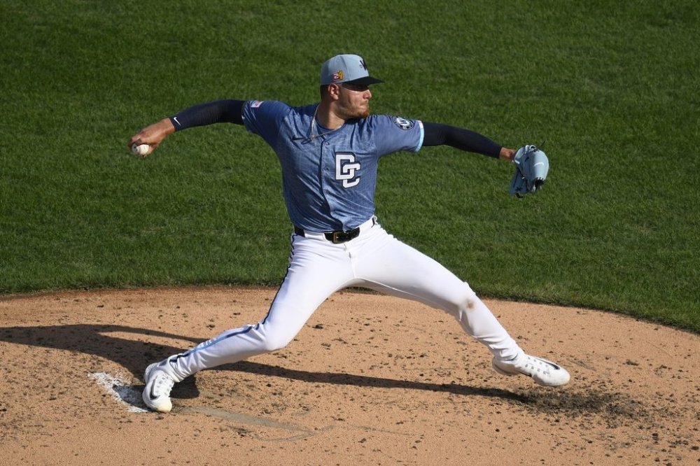 Washington Nationals starting pitcher Cade Cavalli throws during the fifth inning of a baseball game against the Philadelphia Phillies, Saturday, Aug. 16, 2025, in Washington. (AP Photo/Nick Wass)
