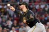 Pittsburgh Pirates pitcher Paul Skenes throws during the first inning of a baseball game against the Boston Red Sox, Friday, Aug. 29, 2025, in Boston. (AP Photo/Mark Stockwell)
