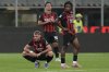 AC Milan players react at the end of a Serie A soccer match between AC Milan and Cremonese, at the San Siro stadium in Milan, Italy, Saturday, Aug. 23, 2025. (AP Photo/Luca Bruno)