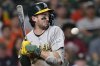 Athletics' Jacob Wilson avoids being hit by a pitch thrown by Houston Astros pitcher Nick Hernandez during the sixth inning of a baseball game Friday, July 25, 2025, in Houston. (AP Photo/David J. Phillip)