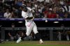 Colorado Rockies' Tyler Freeman (2) hits a two-run home run in the eighth inning of a baseball game against the Arizona Diamondbacks Saturday, Aug. 16, 2025, in Denver. (AP Photo/Geneva Heffernan)