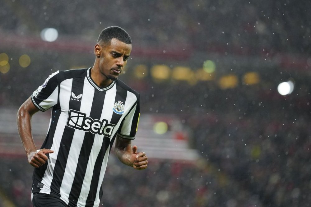 FILE - Newcastle's Alexander Isak celebrates after scoring his side's opening goal during the English Premier League soccer match between Liverpool and Newcastle, at Anfield stadium in Liverpool, England, Monday, Jan. 1, 2024. (AP Photo/Jon Super, File)