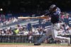 Tampa Bay Rays designated hitter Brandon Lowe hits a grand slam against the Washington Nationals during the second inning of a baseball game at Nationals Park, Sunday, Aug. 31, 2025, in Washington. (AP Photo/Jess Rapfogel)