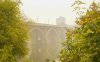 Broadway Bridge is enveloped by forest fire smoke in Saskatoon, Sask., on Sunday, September 3, 2023. THE CANADIAN PRESS/Heywood Yu