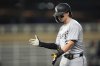 Chicago White Sox's Brooks Baldwin claps after hitting a RBI-single during the ninth inning of a baseball game against the Minnesota Twins Wednesday, Sept. 3, 2025, in Minneapolis. (AP Photo/Abbie Parr)