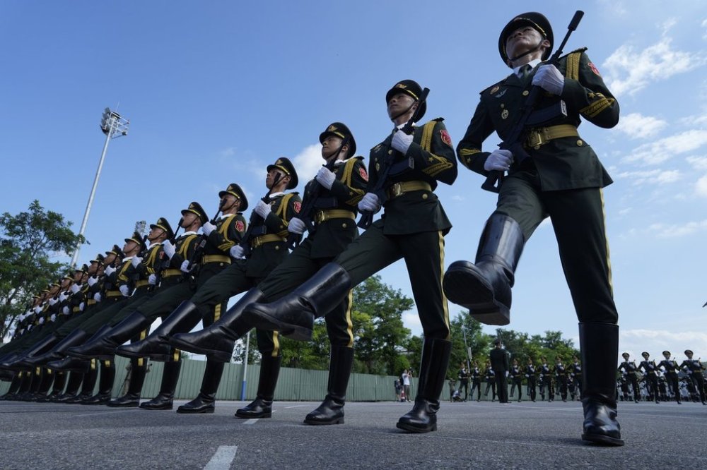 Chinese soldiers rehearses at a camp ahead of the Sept. 3 military parade to commemorate the 80th anniversary of Japan's World War II surrender, in Beijing on Aug. 20, 2025. (AP Photo/Ng Han Guan)