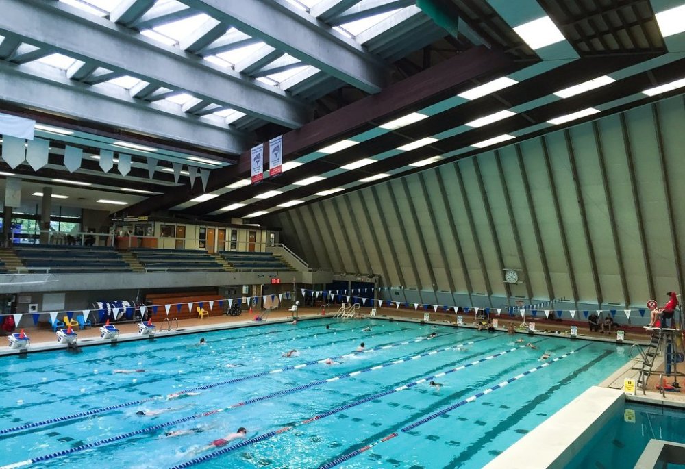 A lifeguard watches over people swimming at the Vancouver Aquatic Centre, in Vancouver, B.C., Friday, April 24, 2015. THE CANADIAN PRESS/Darryl Dyck