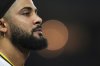 San Diego Padres right fielder Fernando Tatis Jr. looks on during the sixth inning of a baseball game against the Boston Red Sox Saturday, Aug. 9, 2025, in San Diego. (AP Photo/Gregory Bull)