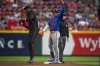 New York Mets' Juan Soto (22) celebrates after hitting a double in the third inning of a baseball game against the Cincinnati Reds, Friday, Sept. 5, 2025, in Cincinnati. (AP Photo/Michael Swensen)