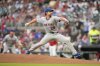 New York Mets pitcher Nolan McLean (26) delivers in the first inning of a baseball game against the Atlanta Braves, Friday, Aug. 22, 2025, in Atlanta. (AP Photo/Brynn Anderson)