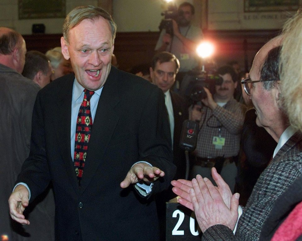 Prime Minister Jean Chrétien greets members of his caucus in Ottawa on Wednesday Dec 13, 2000.(CP PHOTO/Tom Hanson)