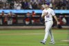 New York Mets pitcher Ryan Helsley walks to the dugout during the eighth inning of a baseball game against the Philadelphia Phillies, Tuesday, Aug. 26, 2025, in New York. (AP Photo/Pamela Smith)