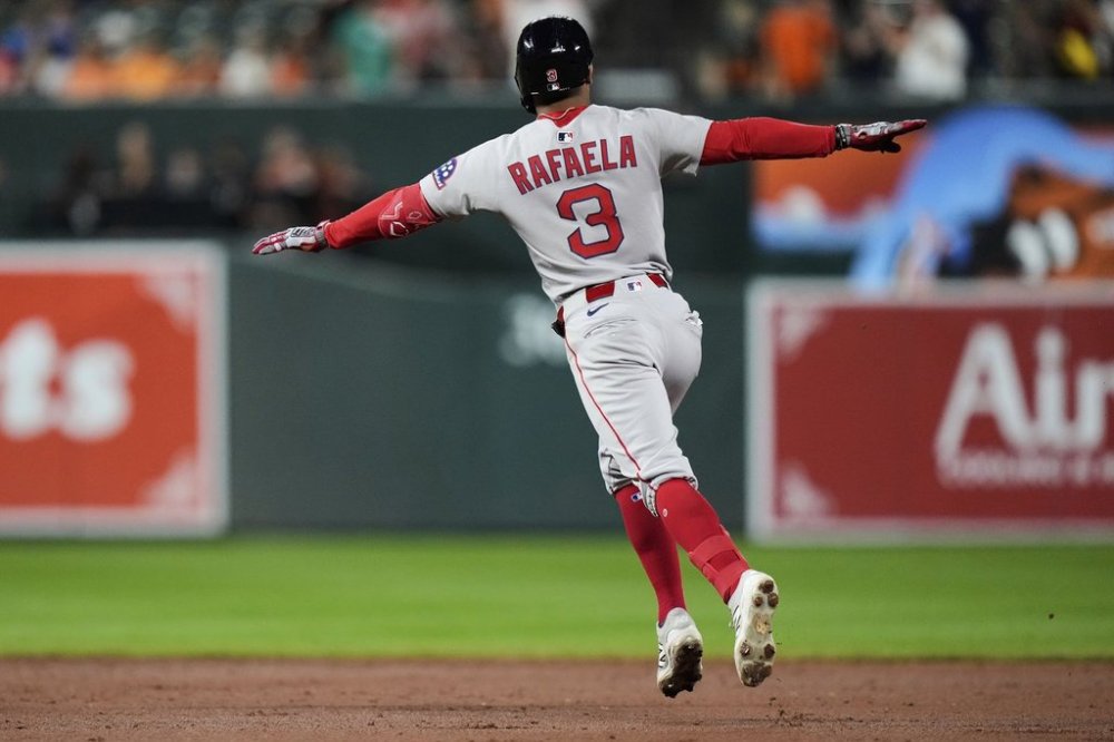 Boston Red Sox's Ceddanne Rafaela rounds the bases after hitting a two-run home run during the ninth inning of a baseball game against the Baltimore Orioles, Wednesday, Aug. 27, 2025, in Baltimore. (AP Photo/Stephanie Scarbrough)