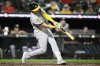 Athletics' Gio Urshela breaks his bat as he lines out during the seventh inning of a baseball game against the Baltimore Orioles, Saturday, Aug. 9, 2025, in Baltimore. (AP Photo/Nick Wass)
