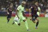 Barcelona's Lamine Yamal, left, and Levantes' Pablo Martinez run for the ball during the La Liga soccer match between Levante and Barcelon in Valencia, Spain, Saturday, Aug. 23, 2025. ((AP Photo/Alberto Saiz)