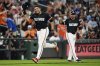 Baltimore Orioles' Samuel Basallo, left, celebrates after hitting a walkoff home run during the ninth inning of a baseball game against the Los Angeles Dodgers, Friday, Sept. 5, 2025, in Baltimore. (AP Photo/Stephanie Scarbrough)