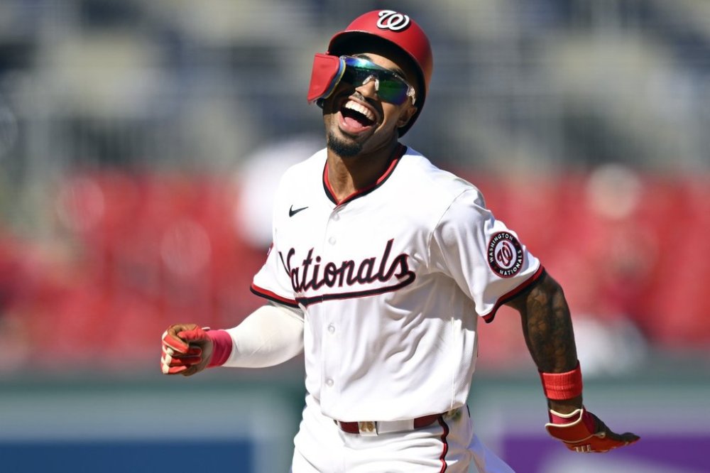 Washington Nationals' Nasim Nunez during runs the bases with a smile after hitting his second home run of the day during the eighth inning of a baseball game against the Miami Marlins Wednesday, Sept. 3, 2025, in Washington. (AP Photo/John McDonnell)