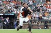 Baltimore Orioles catcher Adley Rutschman throws to first for an out during the third inning of a baseball game against the Seattle Mariners, Tuesday, Aug. 12, 2025, in Baltimore. (AP Photo/Daniel Kucin Jr.)