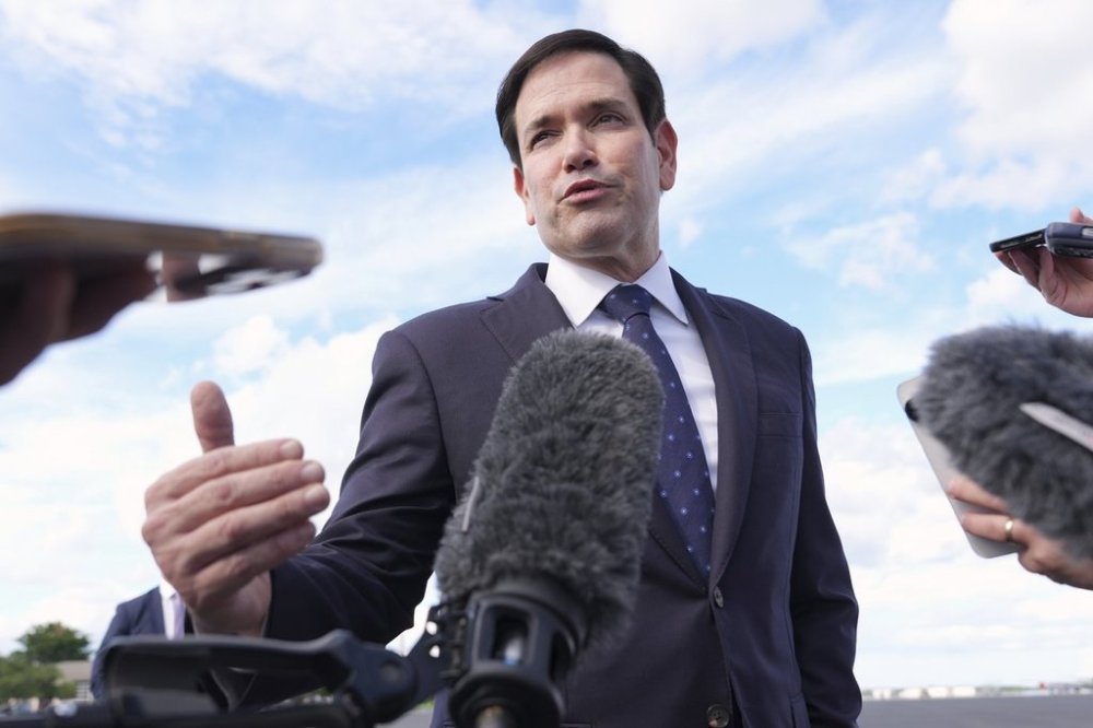 Secretary of State Marco Rubio speaks to reporters before boarding his plane at Homestead Air Reserve Base in Homestead, Fla., en route to Mexico City, Tuesday, Sept. 2, 2025. (AP Photo/Jacquelyn Martin, pool)