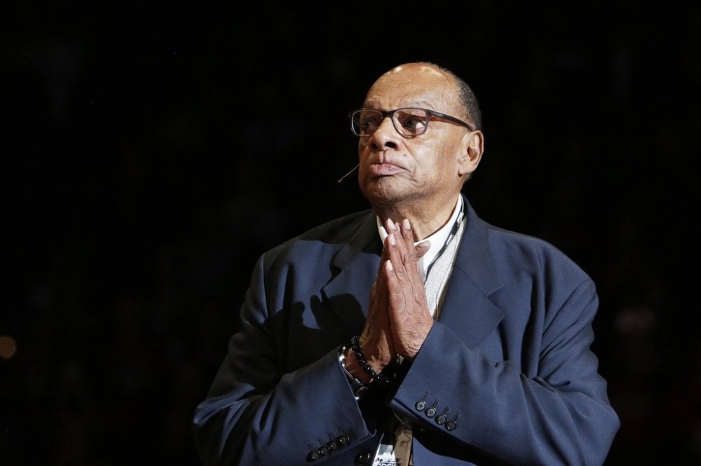 FILE - Former Washington State basketball head coach George Raveling looks on during the school's ceremony to honor him during halftime of an NCAA college basketball game between Washington State and Washington in Pullman, Wash., Feb. 9, 2020. (AP Photo/Young Kwak, file)