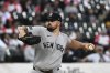 New York Yankees pitcher Carlos Rodón delivers during the first inning of a baseball game against the Chicago White Sox, Friday, Aug. 29, 2025, in Chicago. (AP Photo/Matt Marton)