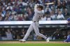 Chicago White Sox's Colson Montgomery hits a one-run single against the Detroit Tigers in the first inning during a baseball game Friday, Sept. 5, 2025, in Detroit. (AP Photo/Paul Sancya)