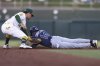 Athletics second baseman Luis Urías, left, tags out Tampa Bay Rays' Chandler Simpson, as Simpson slides into second base attempting to steal during the third inning of a baseball game against the Athletics, Tuesday, Aug. 12, 2025, in West Sacramento, Calif. (AP Photo/Scott Marshall)
