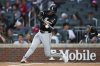 Chicago White Sox' Brooks Baldwin hits a home run in the third inning of a baseball game against the Atlanta Braves, Monday, Aug. 18, 2025, in Atlanta. (AP Photo/Colin Hubbard)