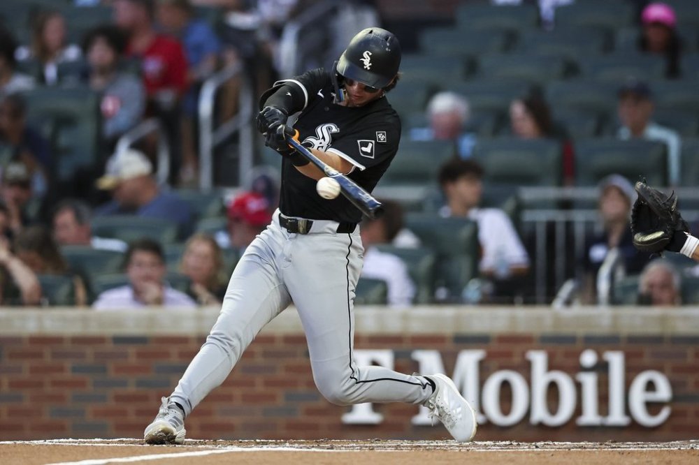 Chicago White Sox' Brooks Baldwin hits a home run in the third inning of a baseball game against the Atlanta Braves, Monday, Aug. 18, 2025, in Atlanta. (AP Photo/Colin Hubbard)