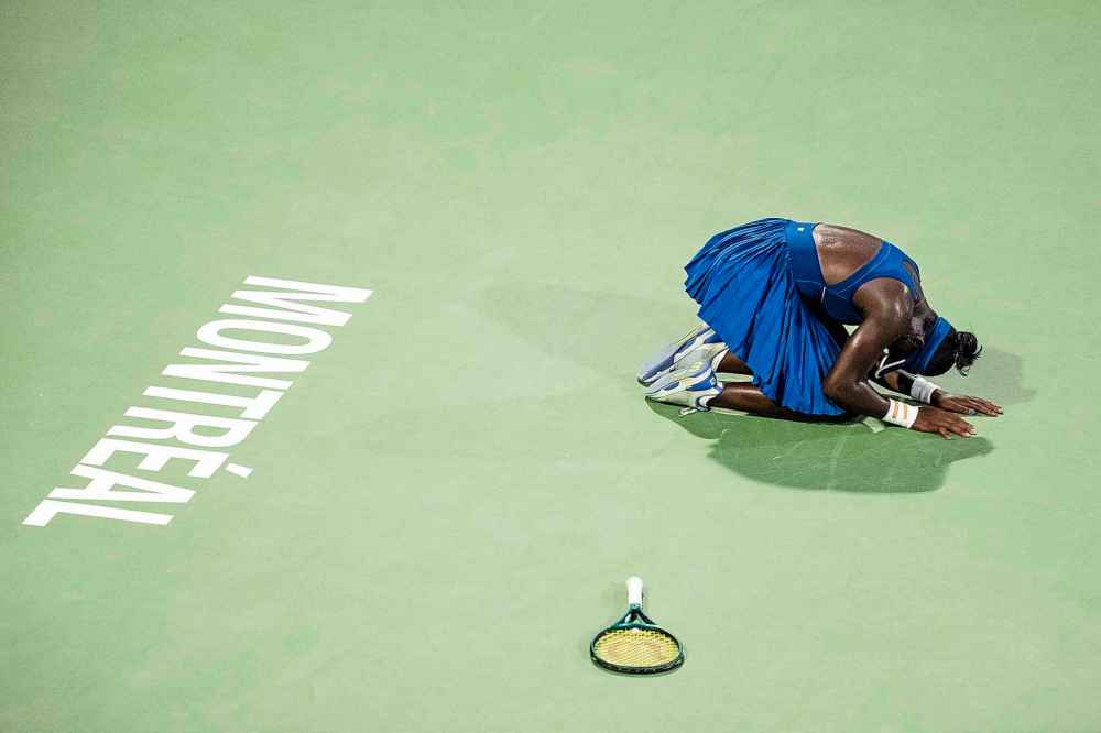 Victoria Mboko of Canada celebrates her win over Naomi Osaka of Japan following finals tennis action at the National Bank Open in Montreal on Thursday, August 7, 2025. THE CANADIAN PRESS/Christopher Katsarov