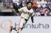 San Francisco Giants' Jung Hoo Lee celebrates after hitting a game-winning RBI single during the ninth inning of a baseball game against the Chicago Cubs, Thursday, Aug. 28, 2025, in San Francisco. (AP Photo/Godofredo A. Vásquez)