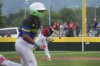 Canada's Felix Hoyano throws to first base during the fourth inning of a baseball game at the Little League World Series against Australia, Sunday, Aug. 17, 2025, in South Williamsport, Pa. (AP Photo/Caleb Craig)