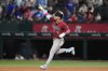 Arizona Diamondbacks' Ketel Marte celebrates his three-run home run in the ninth inning of a baseball game against the Texas Rangers Wednesday, Aug. 13, 2025, in Arlington, Texas. (AP Photo/Tony Gutierrez)