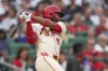 St. Louis Cardinals' Victor Scott II follows through on an RBI single during the second inning of a baseball game against the New York Yankees Saturday, Aug. 16, 2025, in St. Louis. (AP Photo/Jeff Roberson)