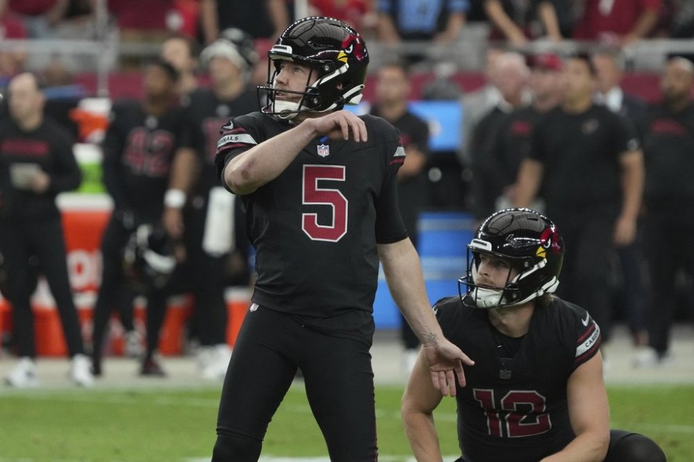 FILE - Arizona Cardinals place kicker Matt Prater (5) watches his kick during the first half of an NFL football game against the Detroit Lions, Sunday, Sept. 22, 2024, in Glendale, Ariz. (AP Photo/Rick Scuteri, File)