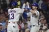 Chicago Cubs' Kyle Tucker, right, celebrates with Kevin Alcántara after hitting a three-run home run during the third inning of a baseball game against the Atlanta Braves in Chicago, Tuesday, Sept. 2, 2025. (AP Photo/Nam Y. Huh)