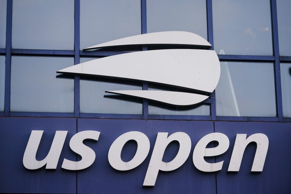 FILE - The U.S. Open logo is displayed on the Arthur Ashe Stadium at the USTA Billie Jean King National Tennis Center in New York, on Thursday, Aug. 27, 2020. (AP Photo/Frank Franklin II, File)