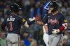 Atlanta Braves' Ha-Seong Kim, right, celebrates with Ozzie Albies after hitting a three-run home run during the seventh inning of a baseball game against the Chicago Cubs, Wednesday, Sept. 3, 2025, in Chicago. (AP Photo/Erin Hooley)
