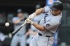 Miami Marlins' Jakob Marsee hits a three run home run off Cleveland Guardians starting pitcher Gavin Williams during the first inning of a baseball game, Wednesday, Aug. 13, 2025, in Cleveland. (AP Photo/David Dermer)