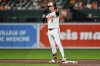 Baltimore Orioles' Gunnar Henderson celebrates after hitting a double during the fourth inning of a baseball game against the Seattle Mariners, Wednesday, Aug. 13, 2025, in Baltimore. (AP Photo/Stephanie Scarbrough)