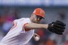 FILE - San Francisco Giants starting pitcher Alex Wood works against the Colorado Rockies during the first inning of a baseball game in San Francisco, May 10, 2022. (AP Photo/John Hefti, File)