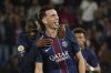 PSG's Fabian Ruiz, reacts after scoring his side opening goal with PSG's Ousmane Dembele, left, during the League One soccer match Paris Saint-Germain against Angers at the Parc des Princes stadium, Friday, Aug. 22, 2025 in Paris. (AP Photo/Aurelien Morissard)