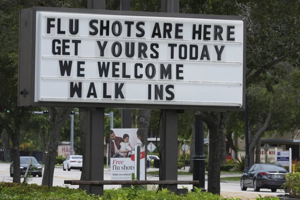 A sign at a Walgreens pharmacy offering flu shots is seen, Thursday, Sept. 4, 2025, in Miami Shores, Fla. (AP Photo/Marta Lavandier)