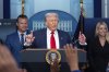 FILE - President Donald Trump speaks with reporters in the James Brady Press Briefing Room at the White House, Aug. 11, 2025, in Washington, as Secretary of Defense Pete Hegseth, left, and Attorney General Pam Bondi look on. (AP Photo/Alex Brandon, File)