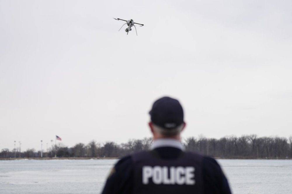 A drone flown by an RCMP officer in Windsor, Ont., hovers over the Detroit River, on Friday, March 7, 2025. THE CANADIAN PRESS/Chris Young