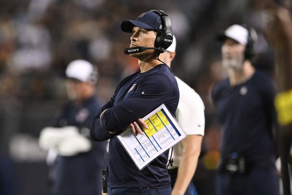 Chicago Bears head coach Ben Johnson watches play in the first half of a preseason NFL football game against the Buffalo Bills Sunday, Aug. 17, 2025, in Chicago. (AP Photo/Paul Beaty)