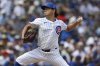 Chicago Cubs starter Shota Imanaga delivers a pitch during the first inning of a baseball game against the Pittsburgh Pirates, Saturday, Aug. 16, 2025, in Chicago. (AP Photo/Paul Beaty)