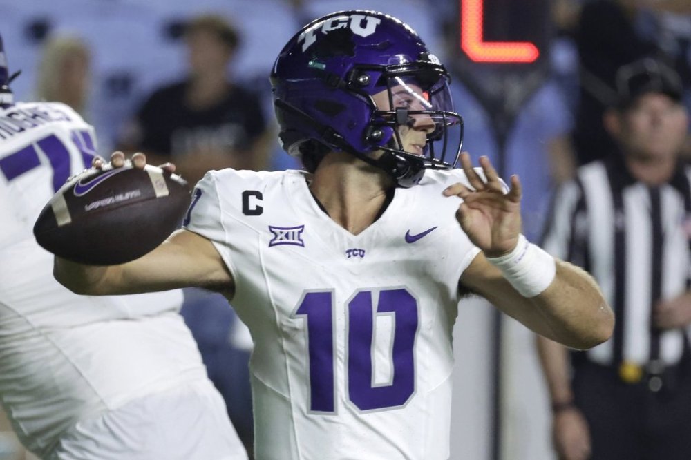 TCU quarterback Josh Hoover looks to pass the ball against North Carolina during the second half of an NCAA college football game Monday, Sept. 1, 2025, in Chapel Hill, N.C. (AP Photo/Chris Seward)