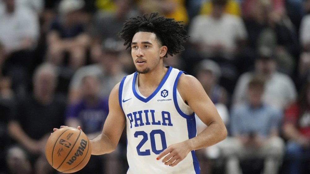 FILE - Philadelphia 76ers Jared McCain brings the ball up court during the second half of an NBA summer league basketball game against the Oklahoma City Thunder, July 8, 2024, in Salt Lake City. (AP Photo/Rick Bowmer, file)