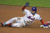 New York Mets catcher Francisco Alvarez grimaces after being injured sliding into second during the seventh inning of the Little League Classic baseball game against the Seattle Mariners at Bowman Field in Williamsport, Pa., Sunday, Aug. 17, 2025. (AP Photo/Gene J. Puskar)